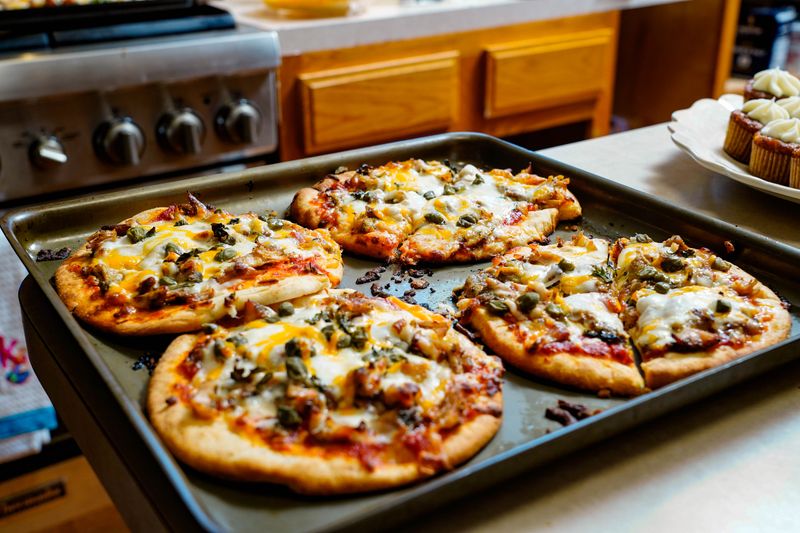 Four cheese pizza with mozzarella gorgonzola parmesan fontina